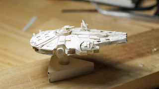 Illustration for article titled This Tiny Papercraft Millennium Falcon Belongs In an Art Gallery